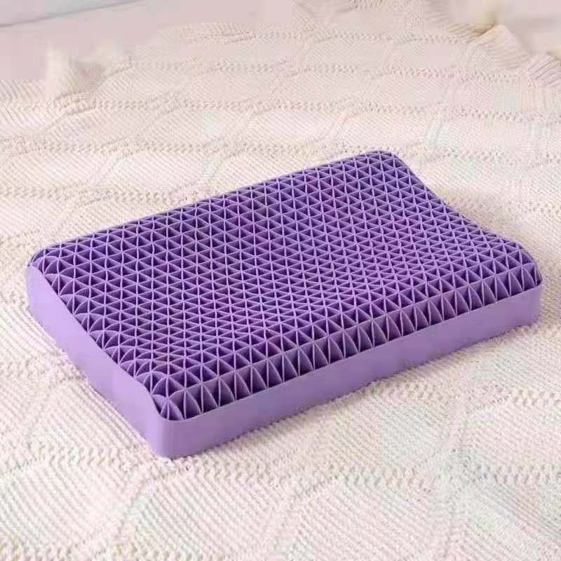 A cost-effective, purple, grid-patterned **Neck Massage Bed Pillow 3D** by **Cloud Dreams** is placed on a beige, textured surface.